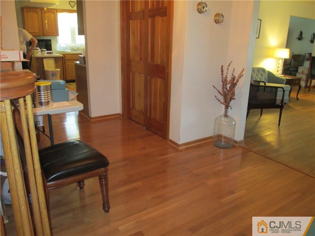 907 New Dover Road Edison, NJ 08820 - Photo 5 of 21 a view of entryway and hall with wooden floor