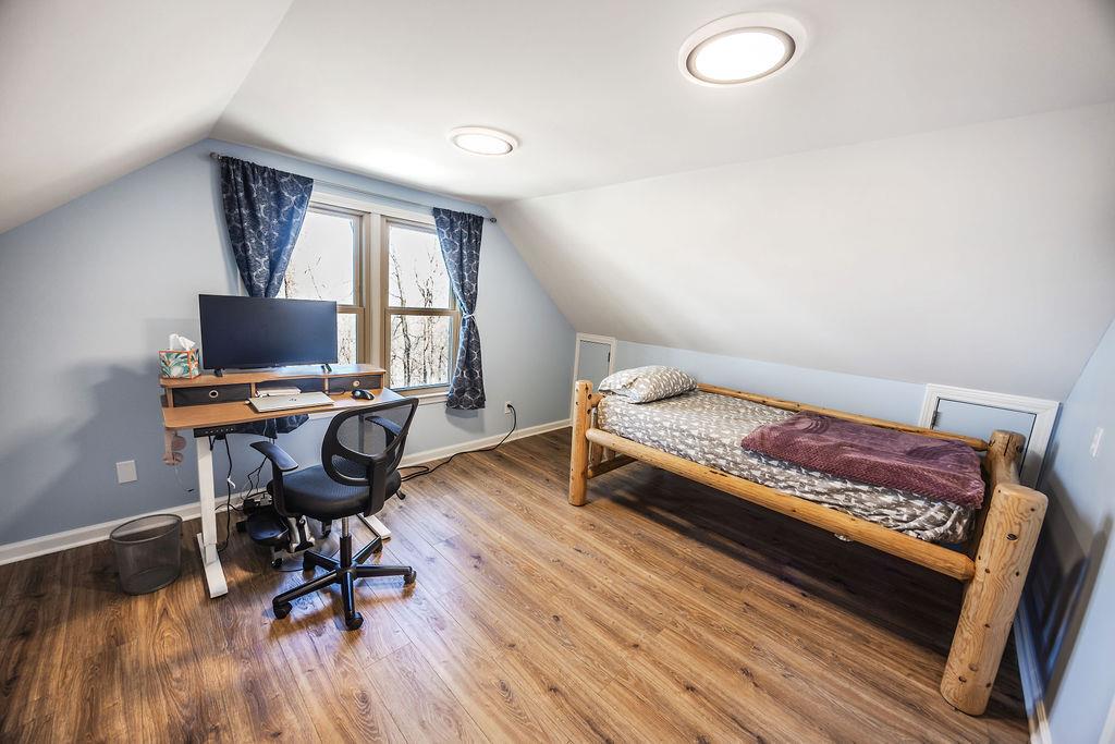 1006 Chestnut Cove Trail Jasper, GA 30143 - Photo 26 of 33 a bedroom with a workspace