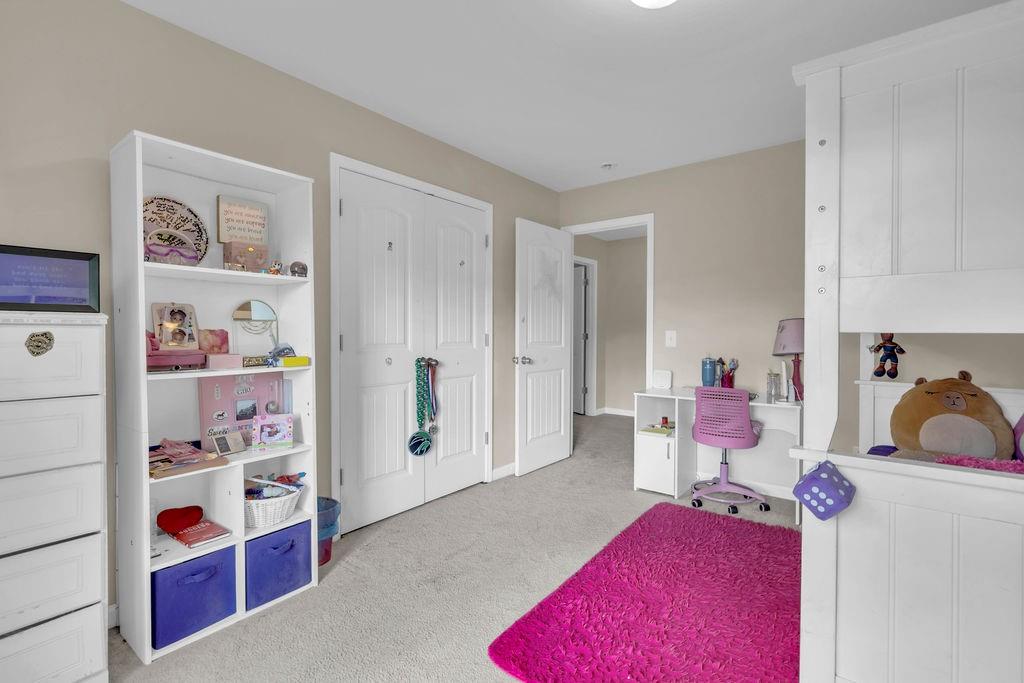 126 Meadow's Walk Drive Byron, GA 31008 - Photo 23 of 37 a bedroom with furniture and a closet