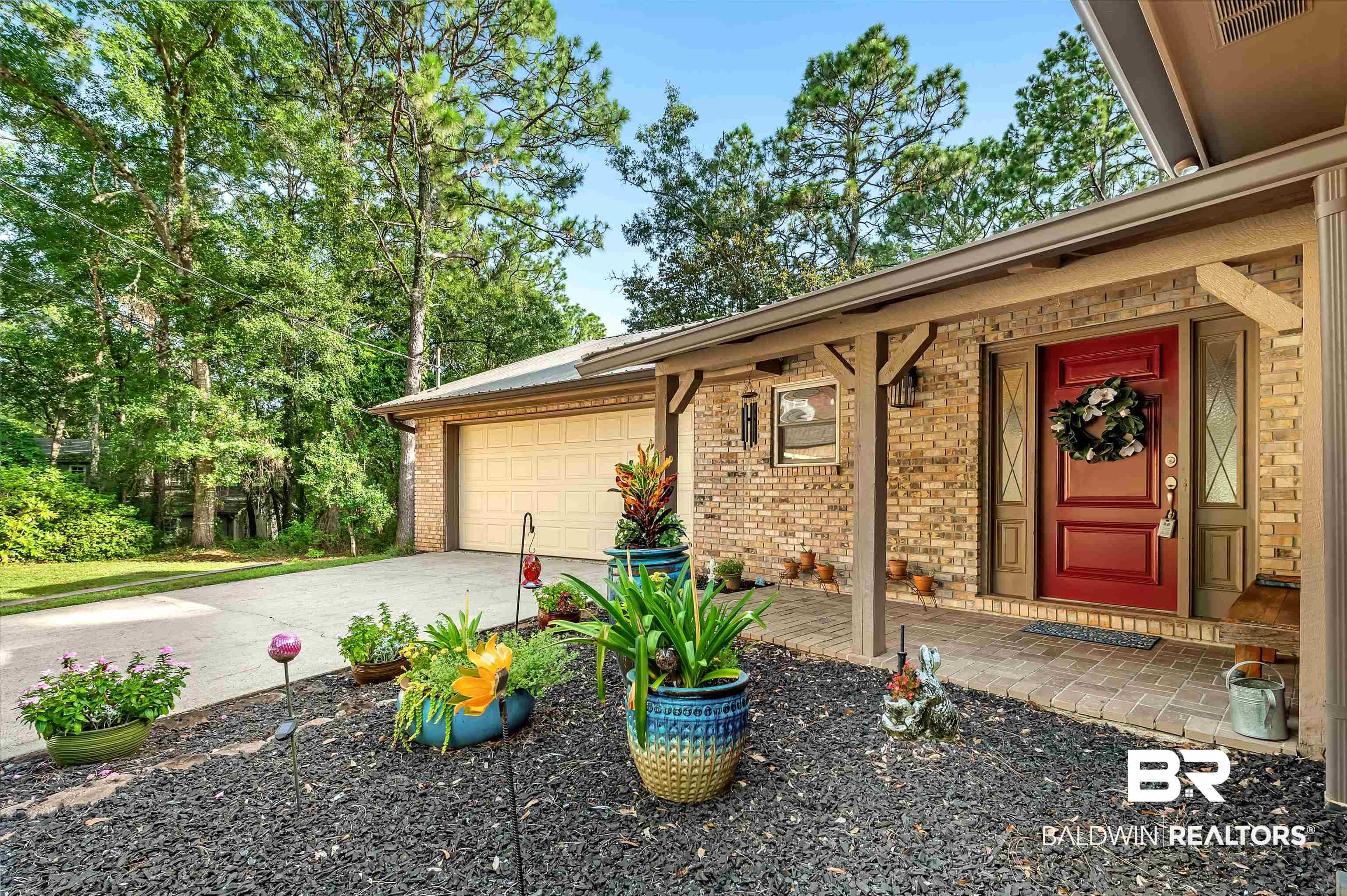 104 James Circle Daphne, AL 36526 - Photo 5 of 62 Exterior space with a garage