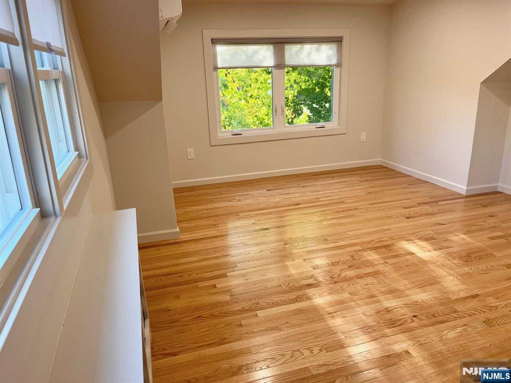 678 Grove Street Ridgewood, NJ 07450 - Photo 7 of 14 a view of an empty room with a window