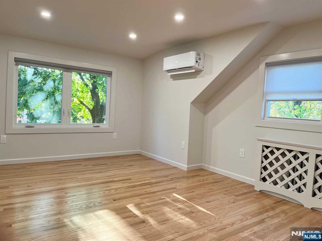 678 Grove Street Ridgewood, NJ 07450 - Photo 8 of 14 a view of an empty room with a window