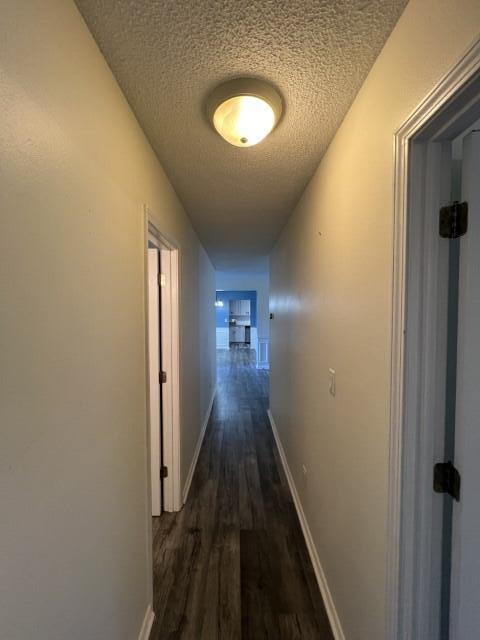 5 Neptune Drive Mary Esther, FL 32569 - Photo 14 of 32 a view of a hallway with wooden floor