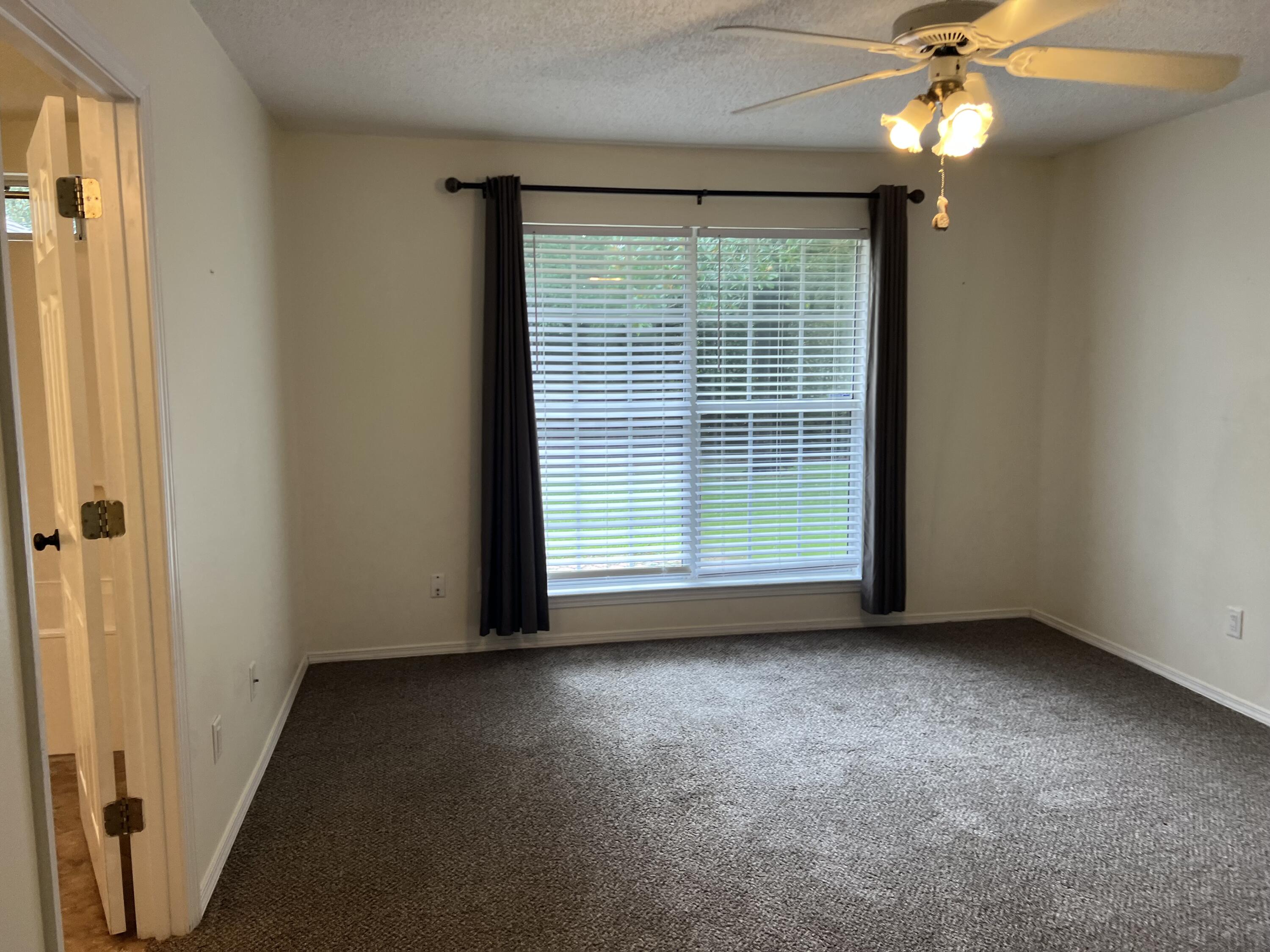 5 Neptune Drive Mary Esther, FL 32569 - Photo 16 of 32 a view of empty room with window