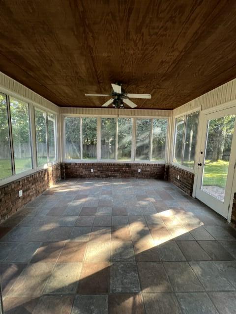 5 Neptune Drive Mary Esther, FL 32569 - Photo 19 of 32 a view of a building with a floor to ceiling window and an outdoor space