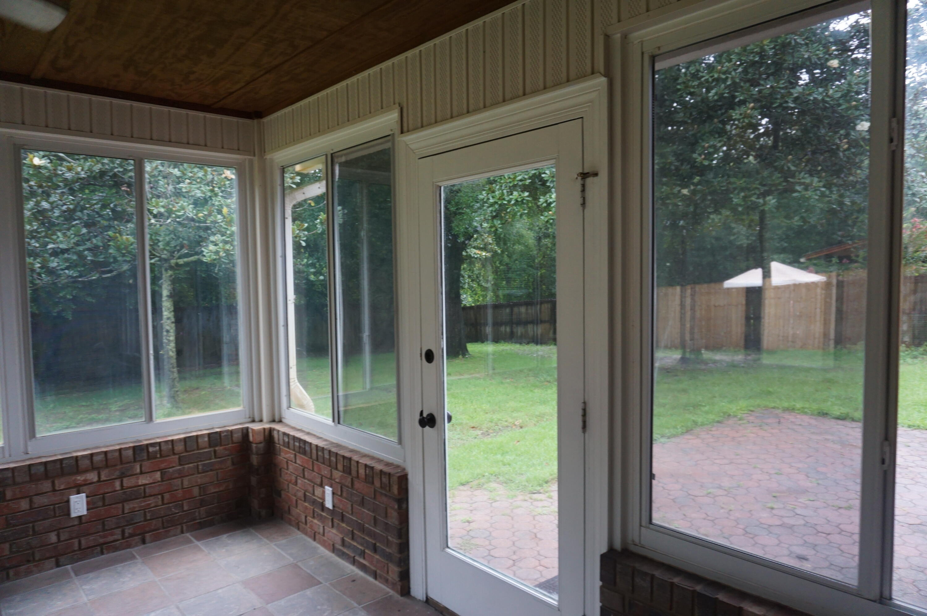 5 Neptune Drive Mary Esther, FL 32569 - Photo 20 of 32 a house view with a garden space