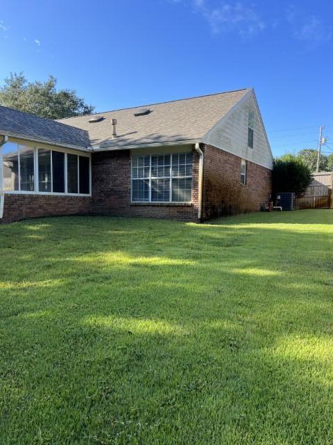 5 Neptune Drive Mary Esther, FL 32569 - Photo 29 of 32 a backyard of a house with table and chairs