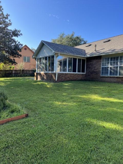 5 Neptune Drive Mary Esther, FL 32569 - Photo 30 of 32 a front view of a house with garden