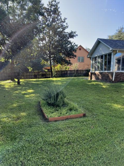 5 Neptune Drive Mary Esther, FL 32569 - Photo 31 of 32 a front view of a house with a yard