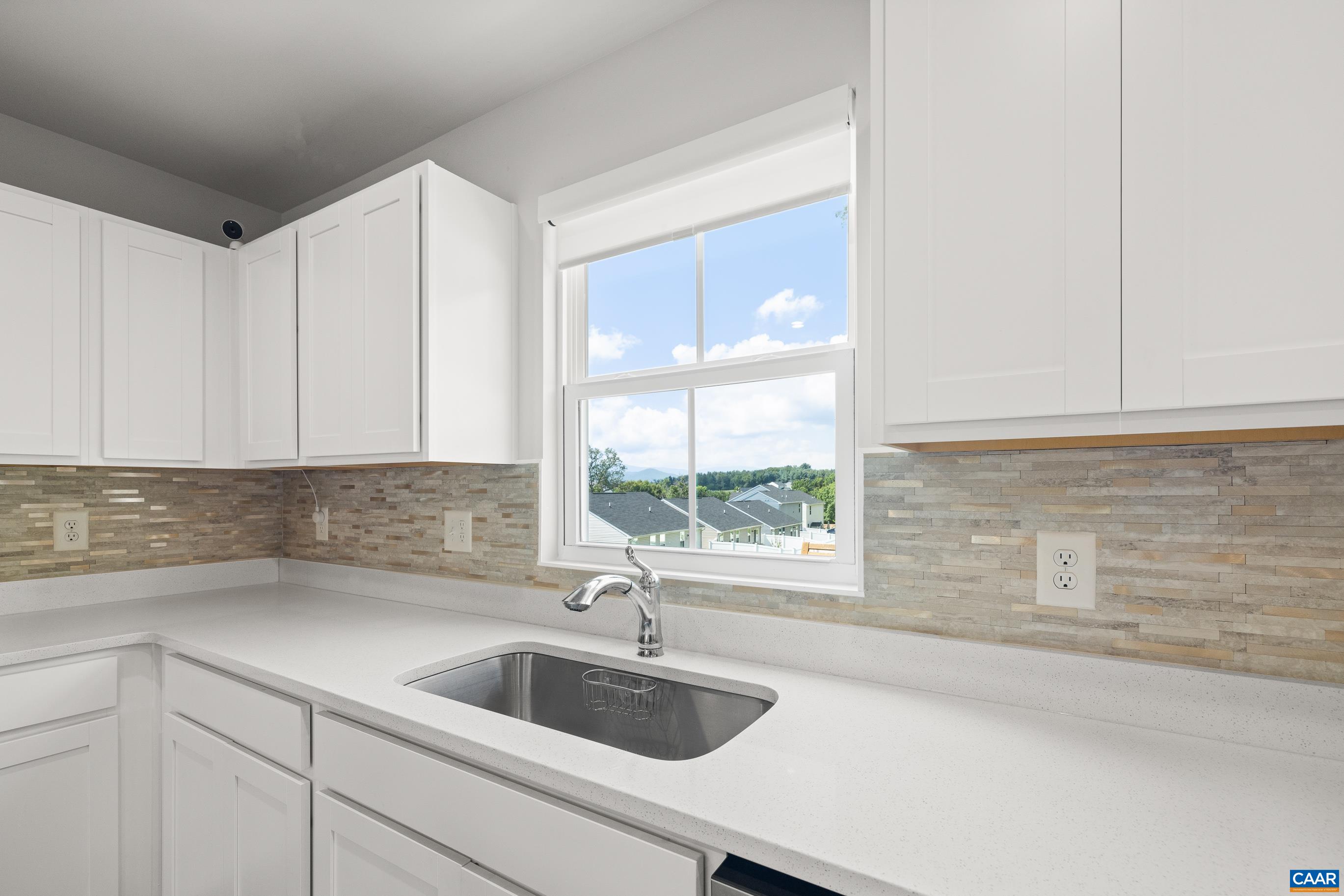 132 White Birch Road Waynesboro, VA 22980 - Photo 14 of 47 a kitchen with a sink and cabinets