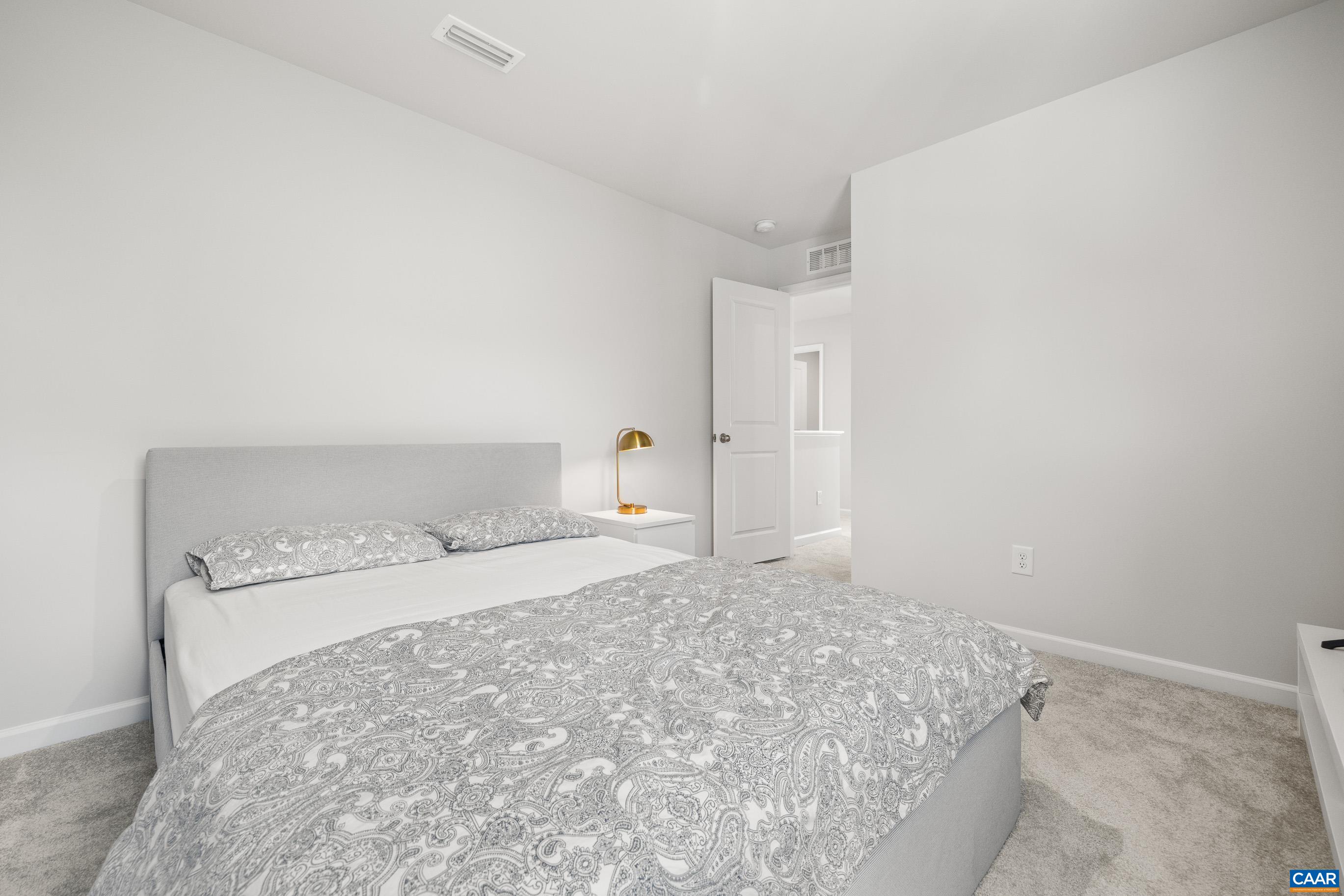 132 White Birch Road Waynesboro, VA 22980 - Photo 34 of 47 a bedroom with a bed and a window