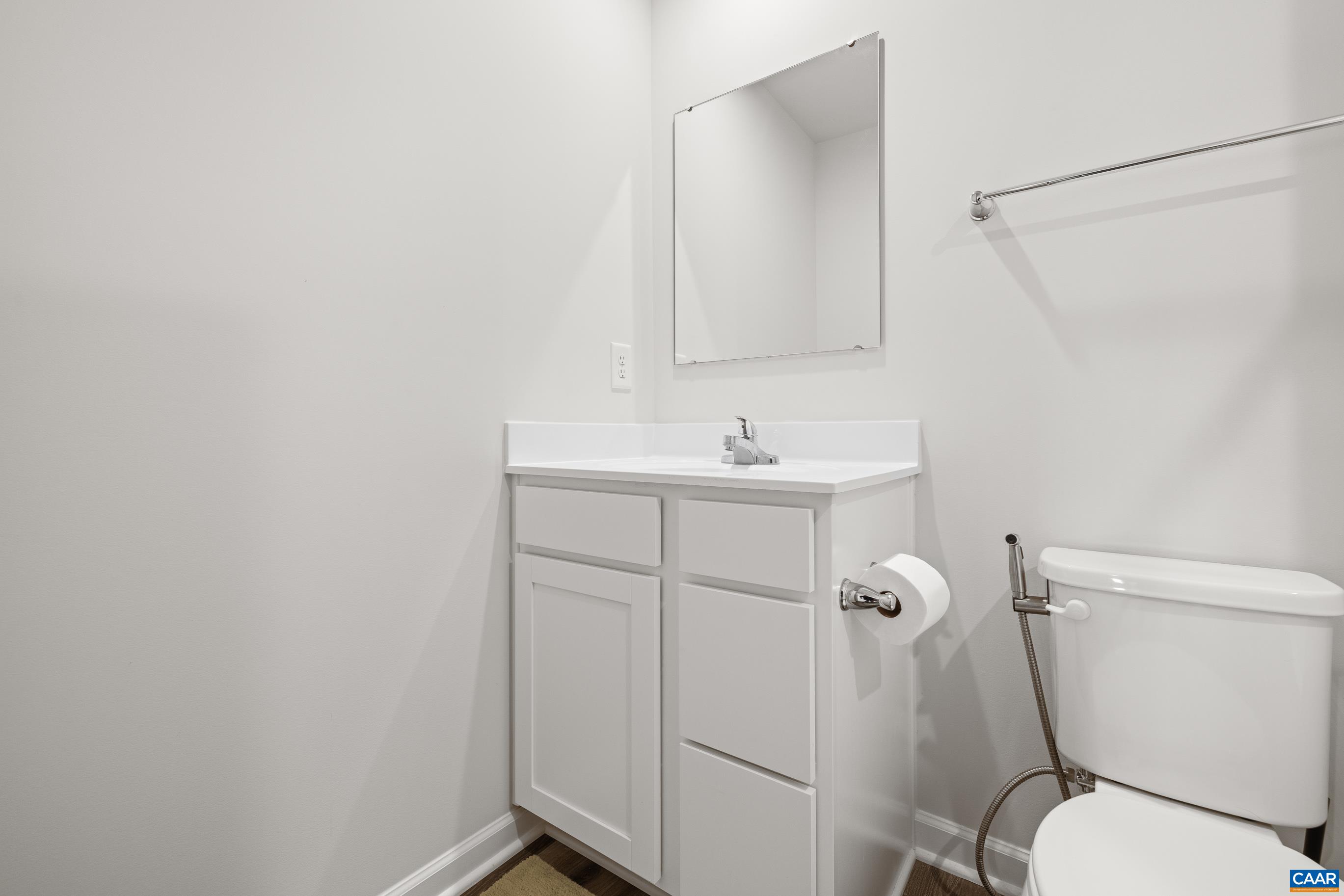 132 White Birch Road Waynesboro, VA 22980 - Photo 35 of 47 a bathroom with a toilet sink vanity and mirror