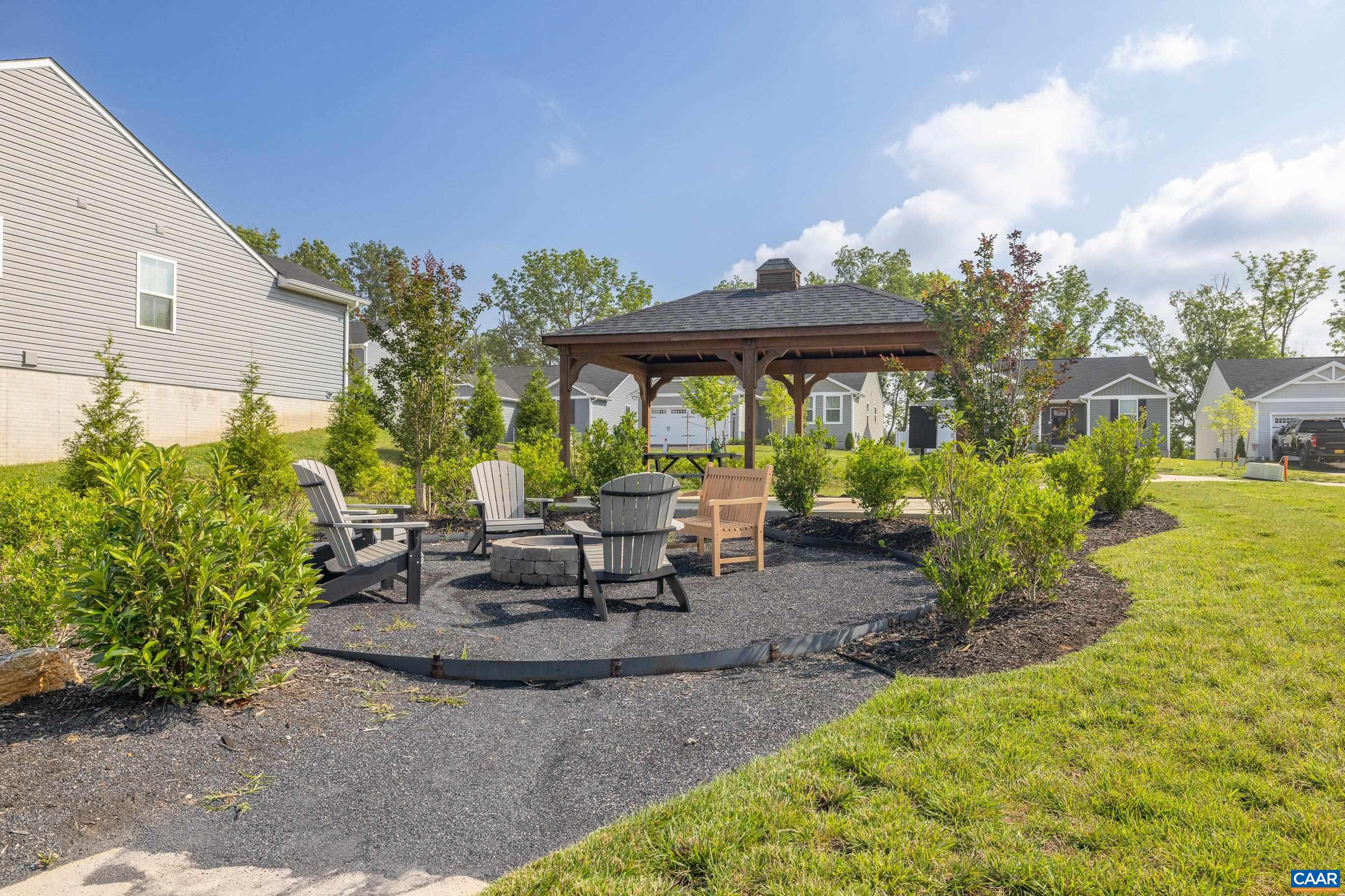 132 White Birch Road Waynesboro, VA 22980 - Photo 46 of 47 a view of a patio with table and chairs and potted plants