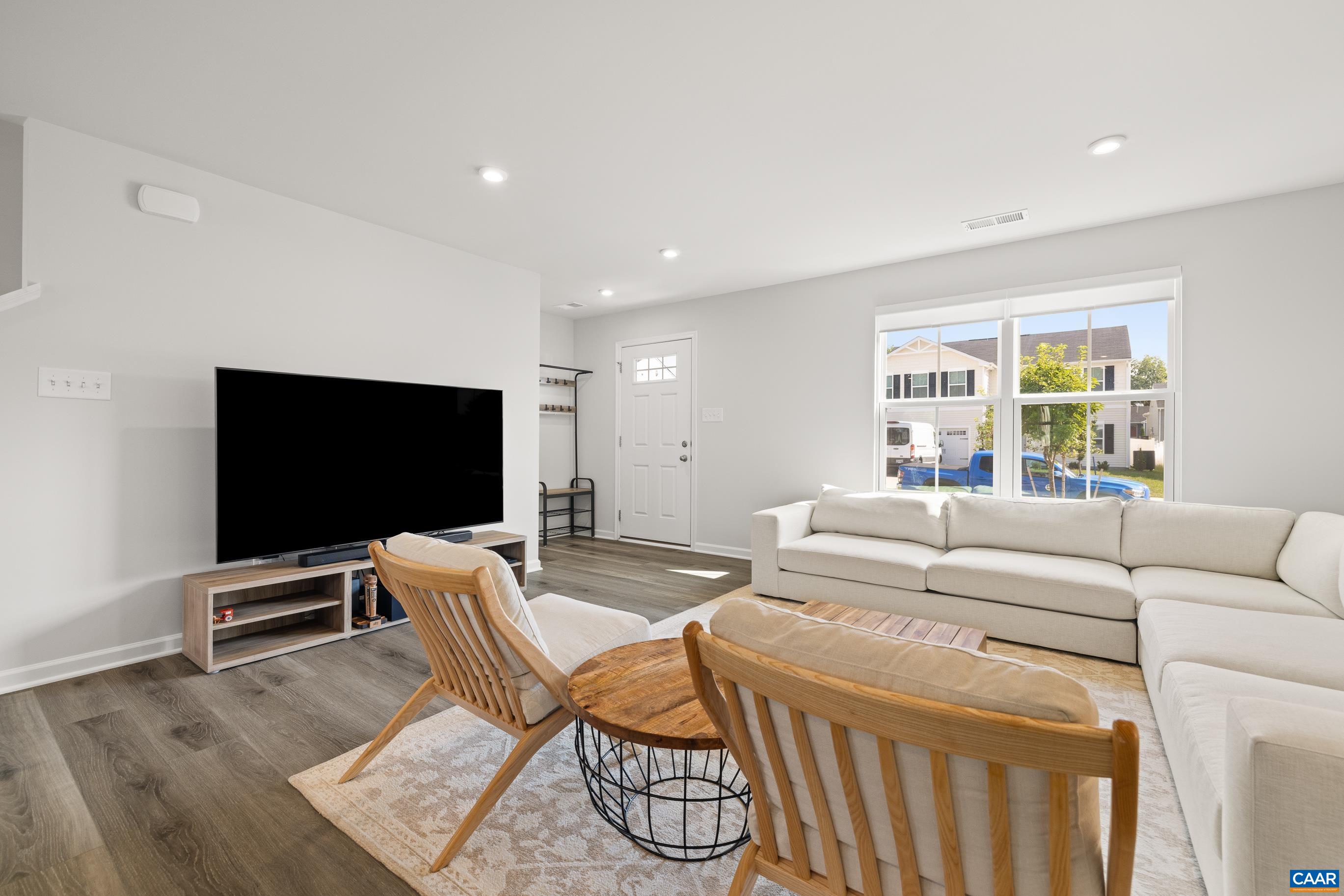 132 White Birch Road Waynesboro, VA 22980 - Photo 8 of 47 a living room with furniture and a flat screen tv