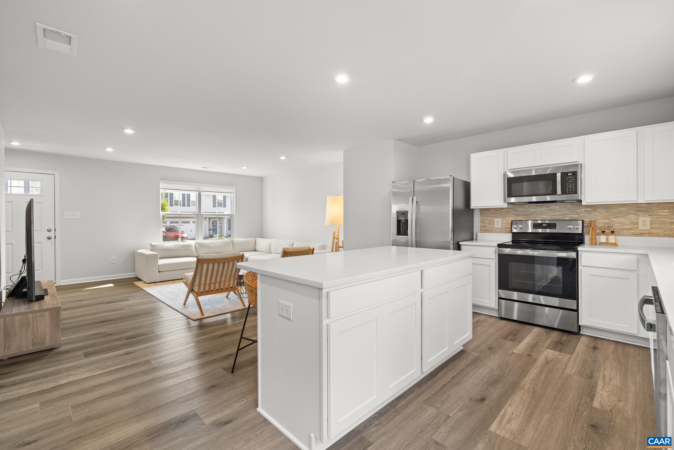 132 White Birch Road Waynesboro, VA 22980 - Photo 10 of 47 a kitchen with white cabinets and stainless steel appliances