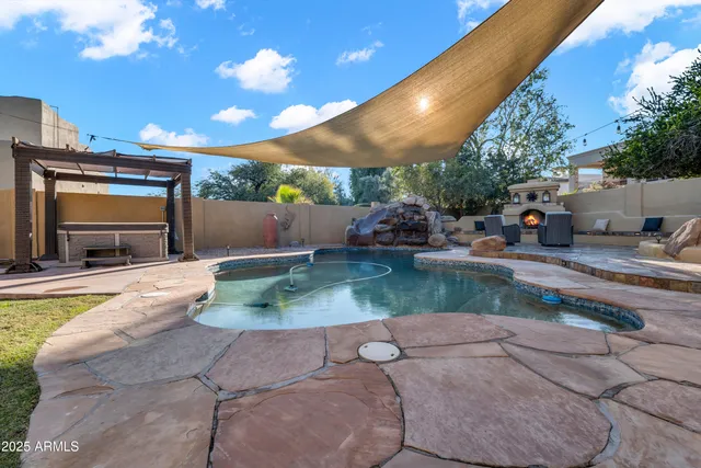 a view of a house with a yard and garage