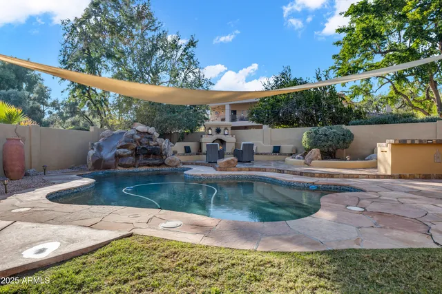 an aerial view of a house with a garden