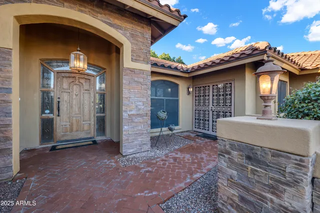 an aerial view of a house with a garden