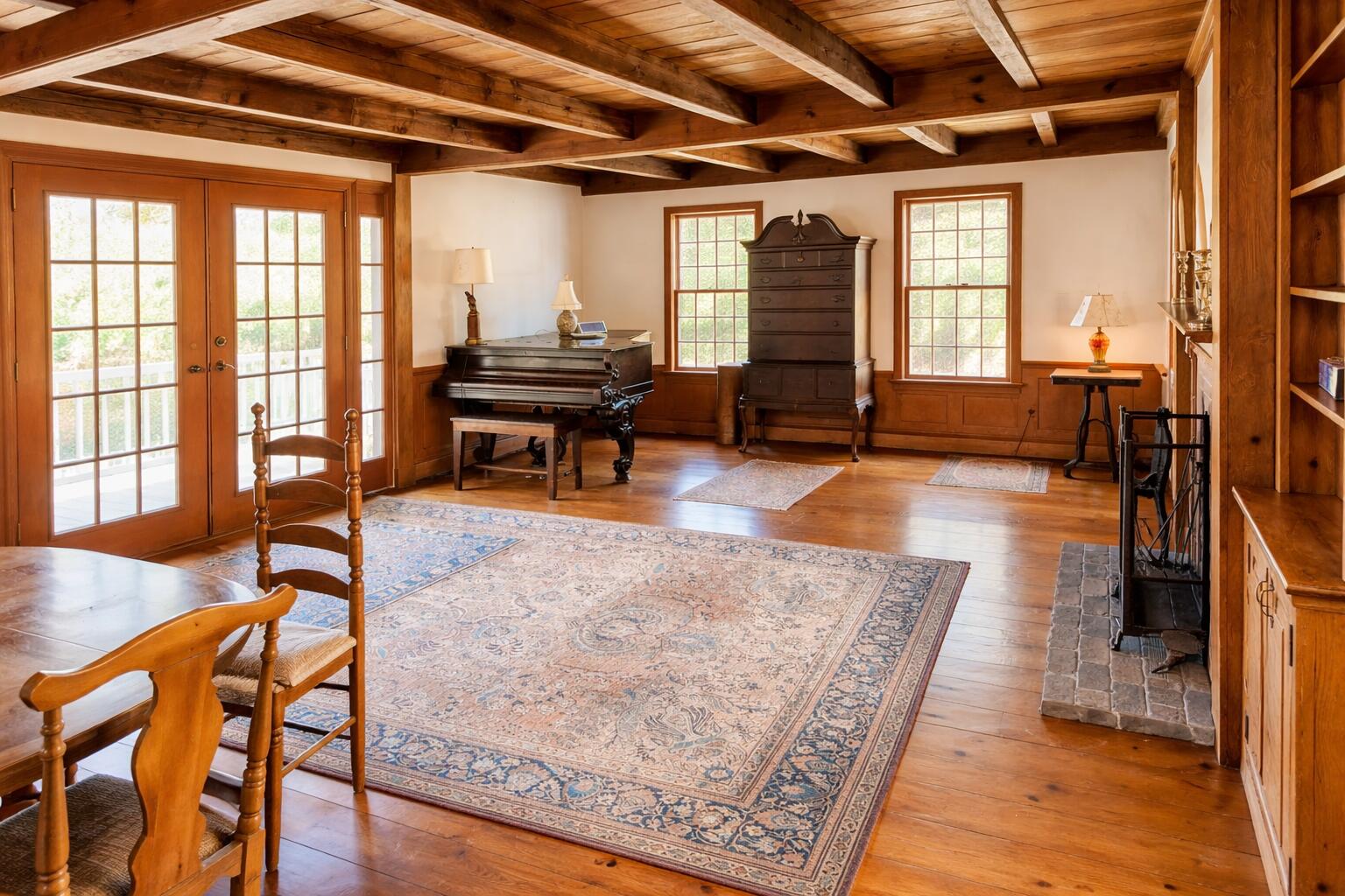 69 Allyn Lane Barnstable, MA 02630 - Photo 7 of 21 a living room with patio furniture and a wooden floor