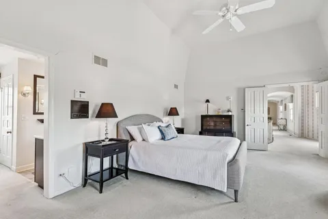 a view of room with window and wooden floor