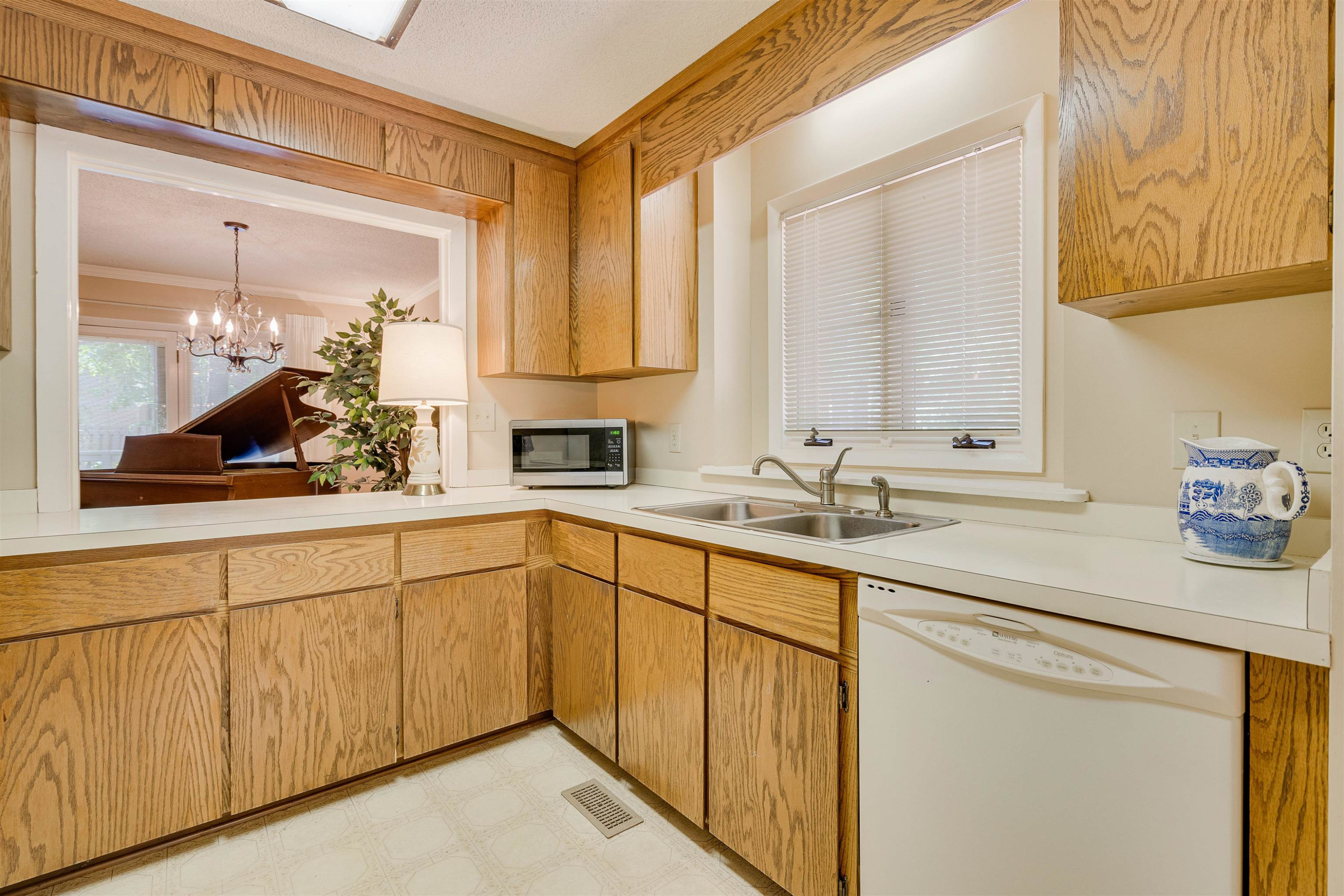 1 Pinnacle Road Durham, NC 27705 - Photo 17 of 38 a kitchen with sink and cabinets