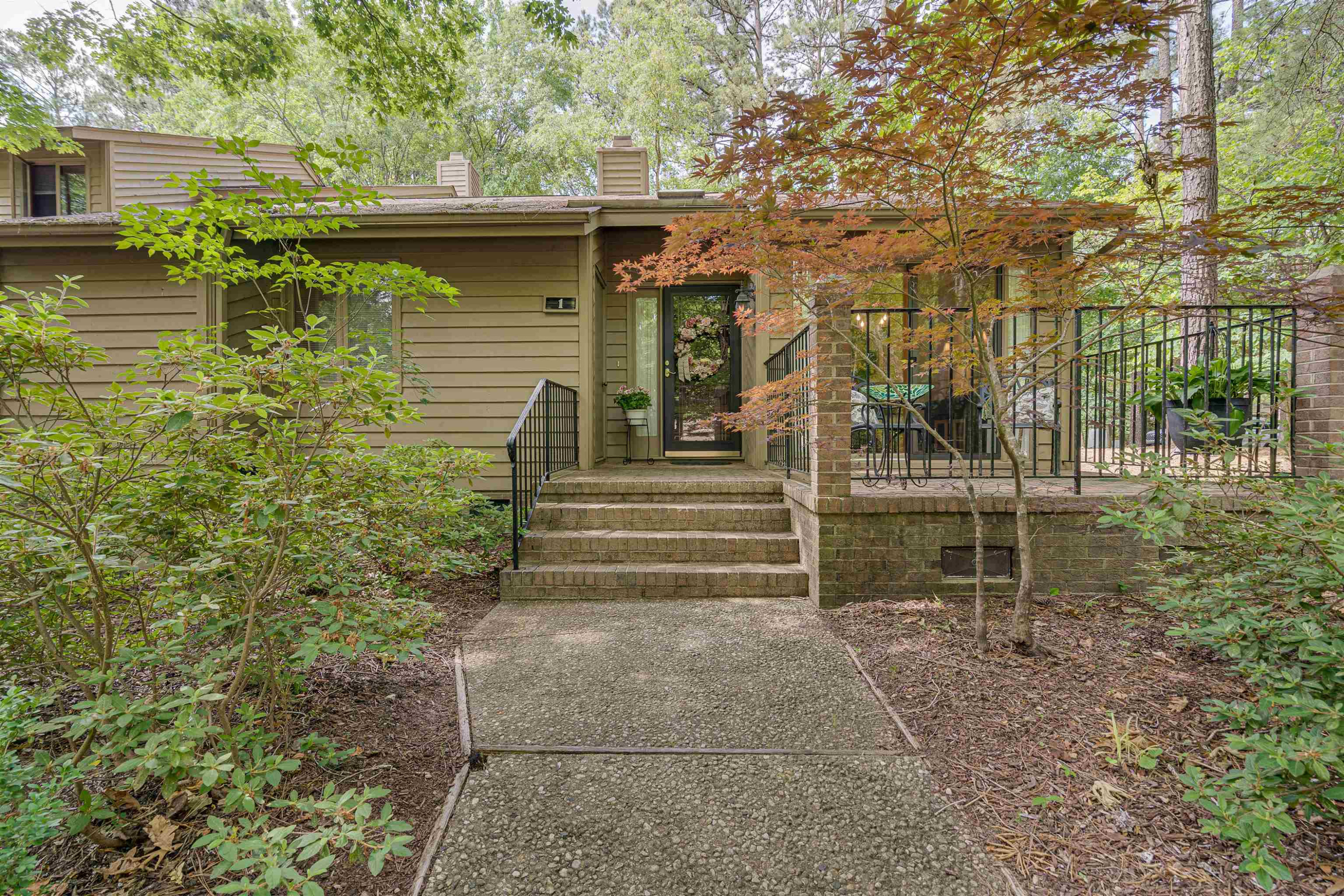 1 Pinnacle Road Durham, NC 27705 - Photo 2 of 38 a house view with a backyard space