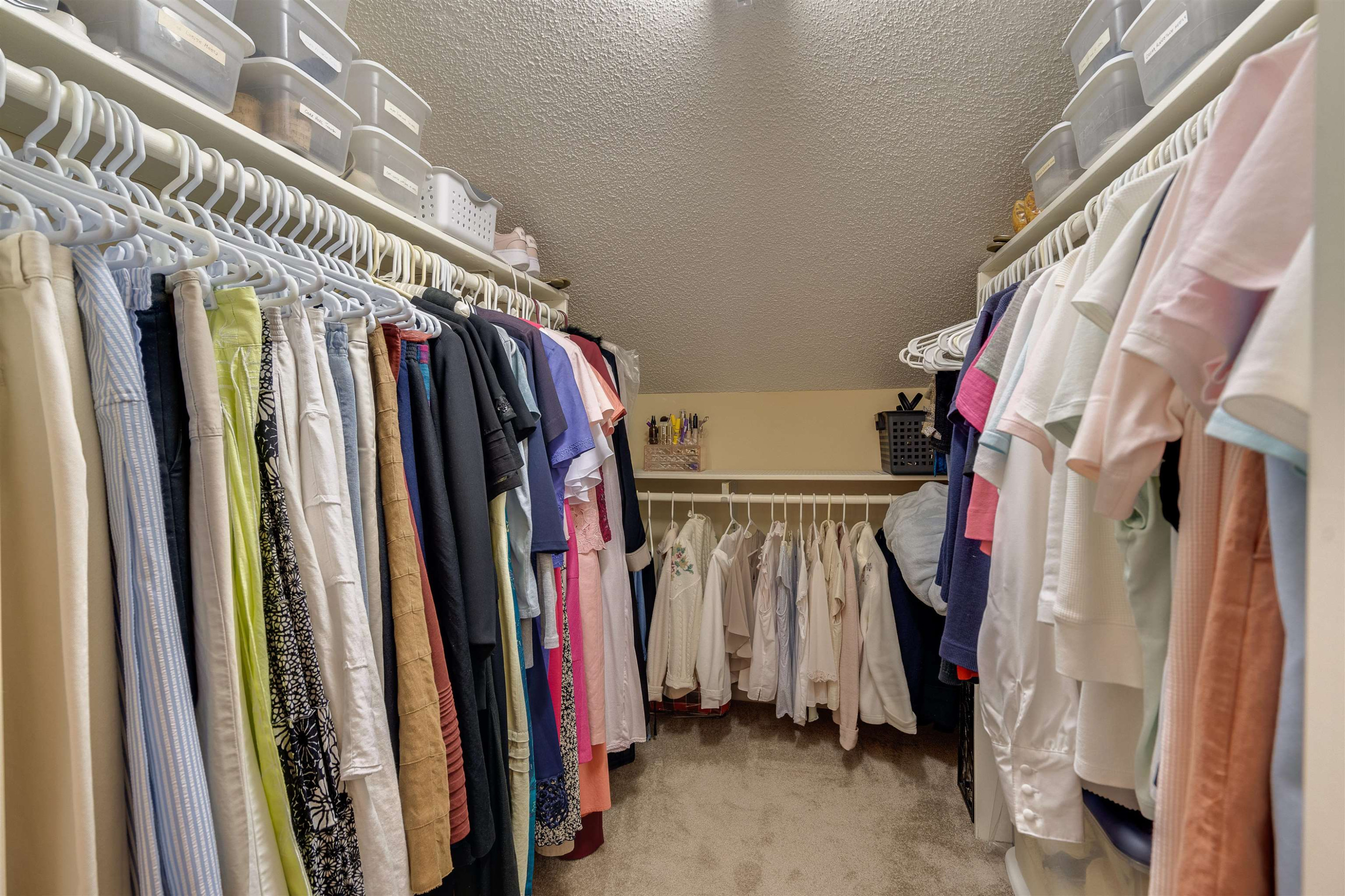 1 Pinnacle Road Durham, NC 27705 - Photo 23 of 38 a view of walk in closet with clothes