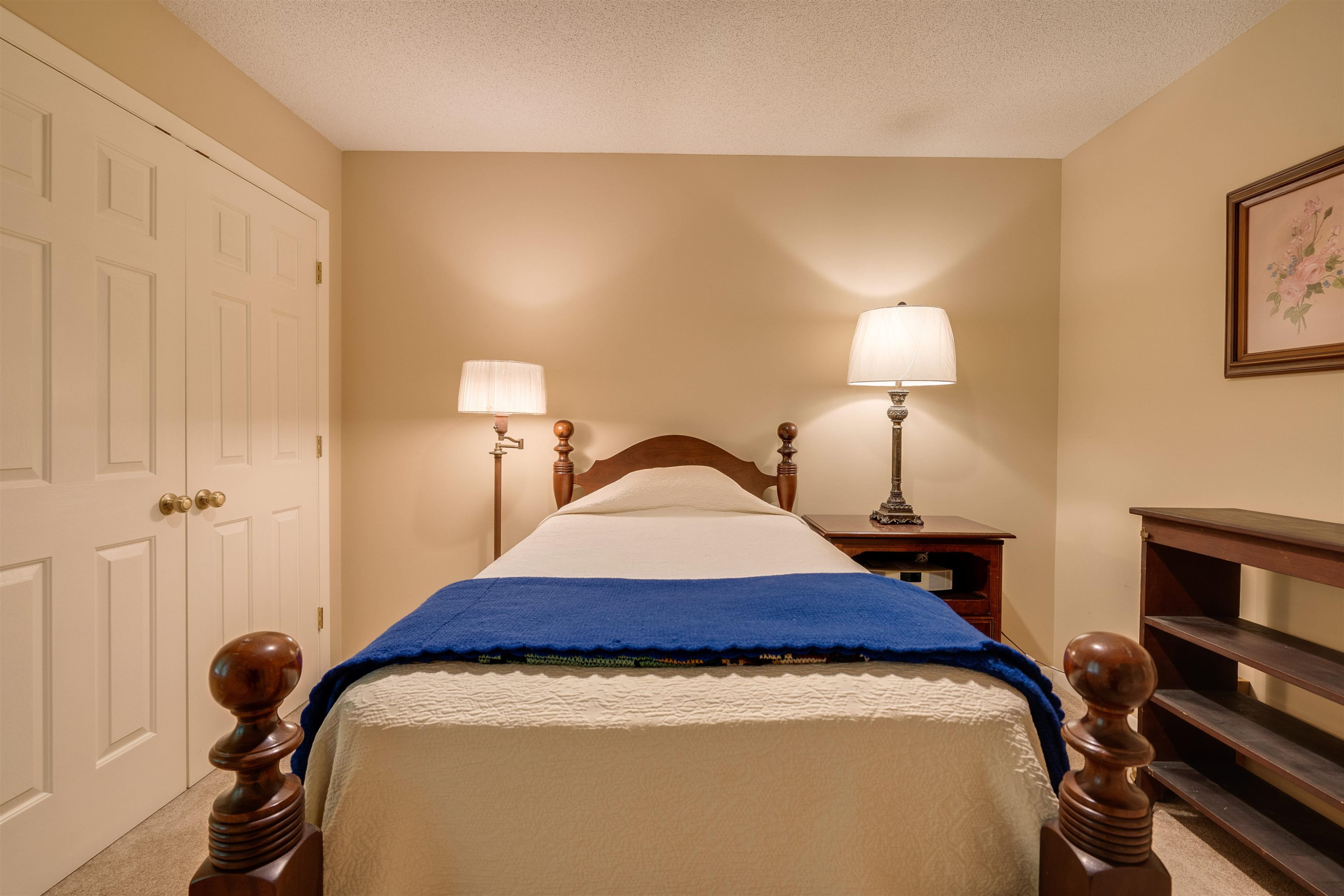 1 Pinnacle Road Durham, NC 27705 - Photo 27 of 38 a bedroom with a bed and a lamp