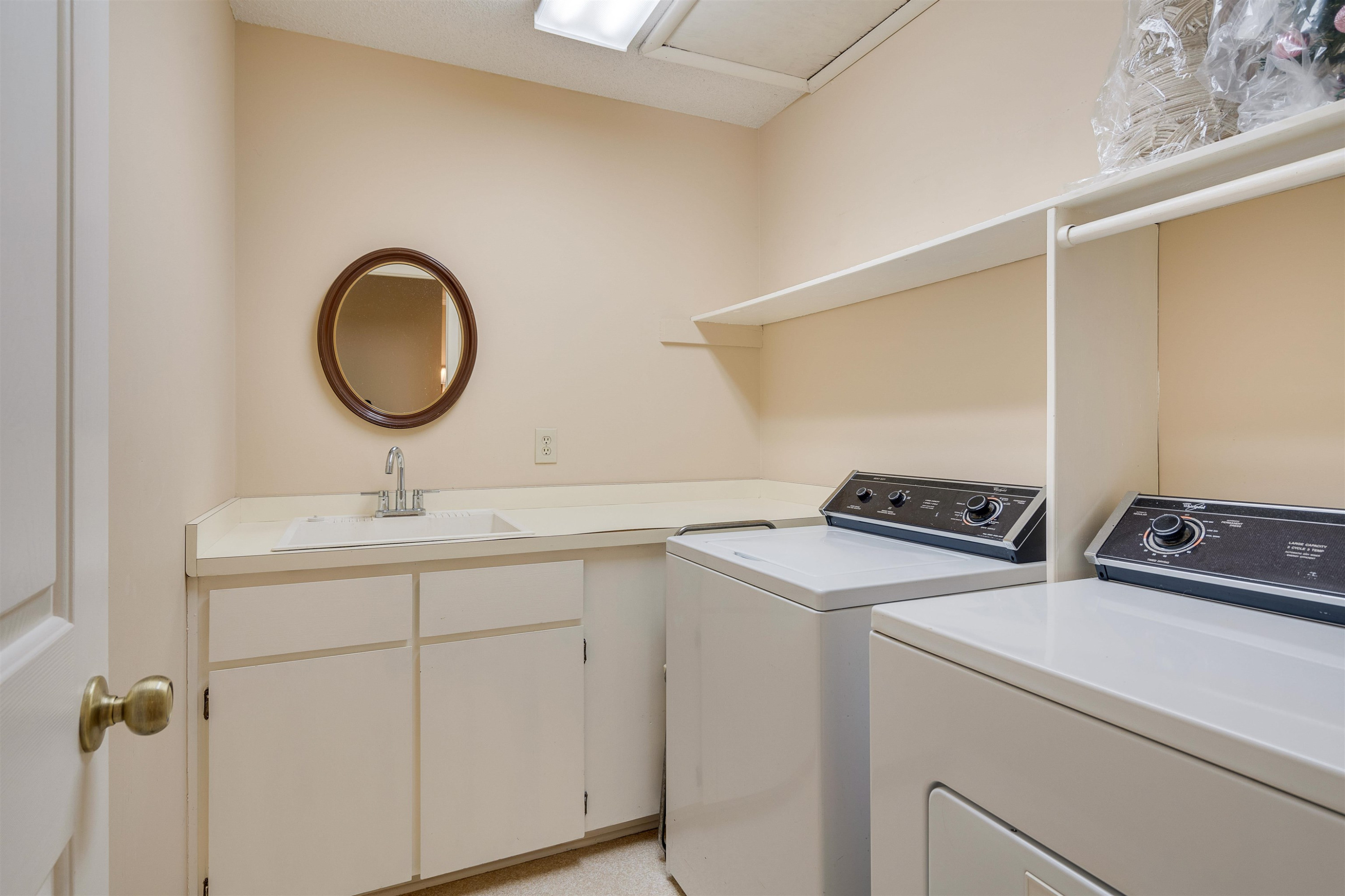 1 Pinnacle Road Durham, NC 27705 - Photo 29 of 38 a utility room with dryer and washer