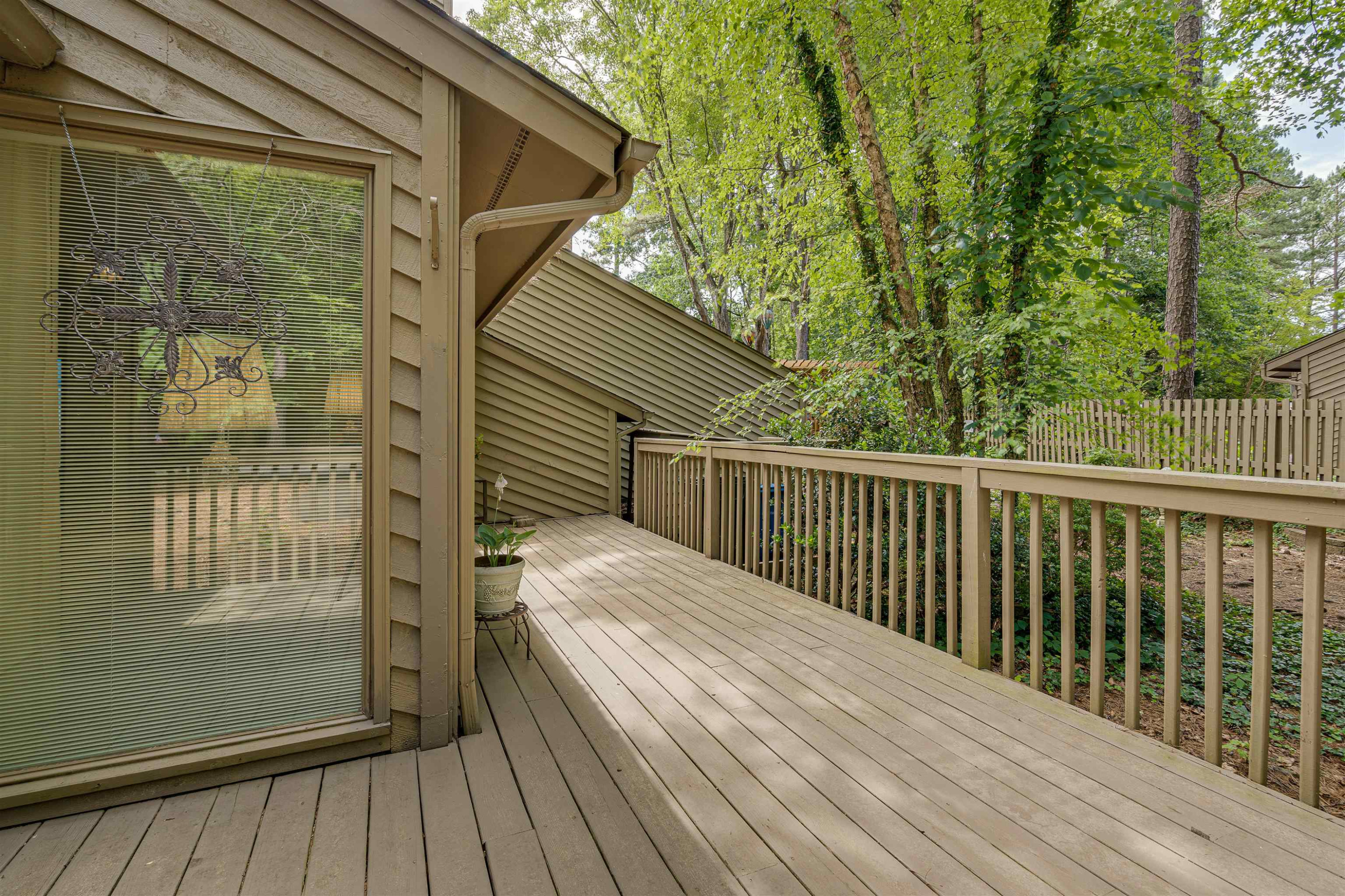 1 Pinnacle Road Durham, NC 27705 - Photo 32 of 38 a view of backyard with a deck and wooden floor