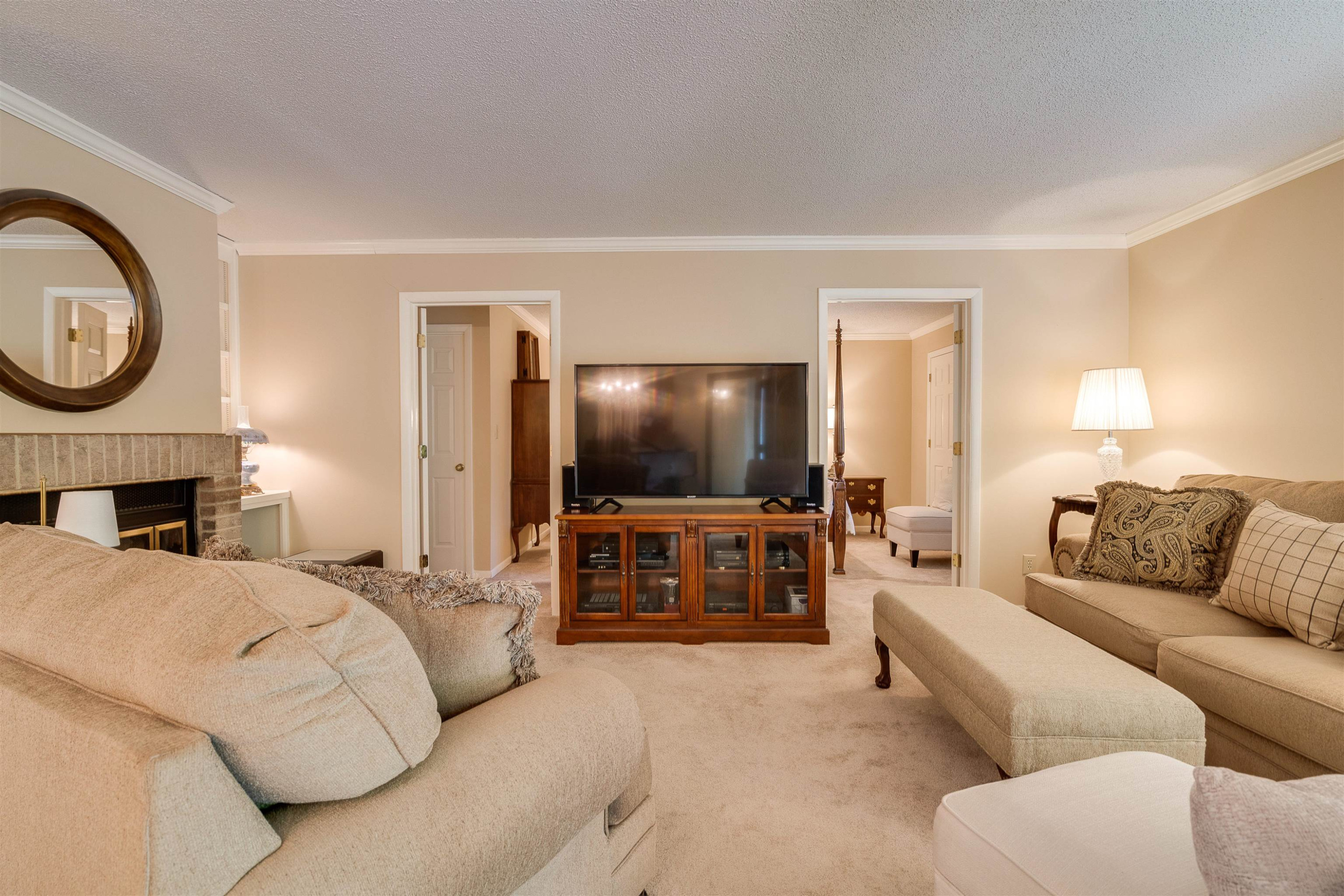 1 Pinnacle Road Durham, NC 27705 - Photo 9 of 38 a living room with furniture and a flat screen tv