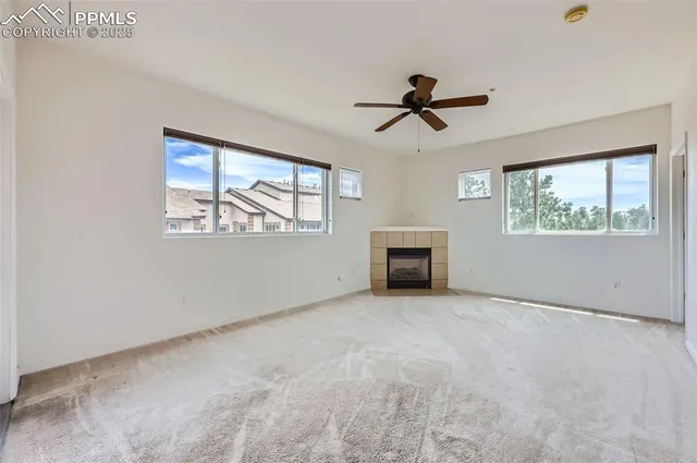 a view of empty room with windows