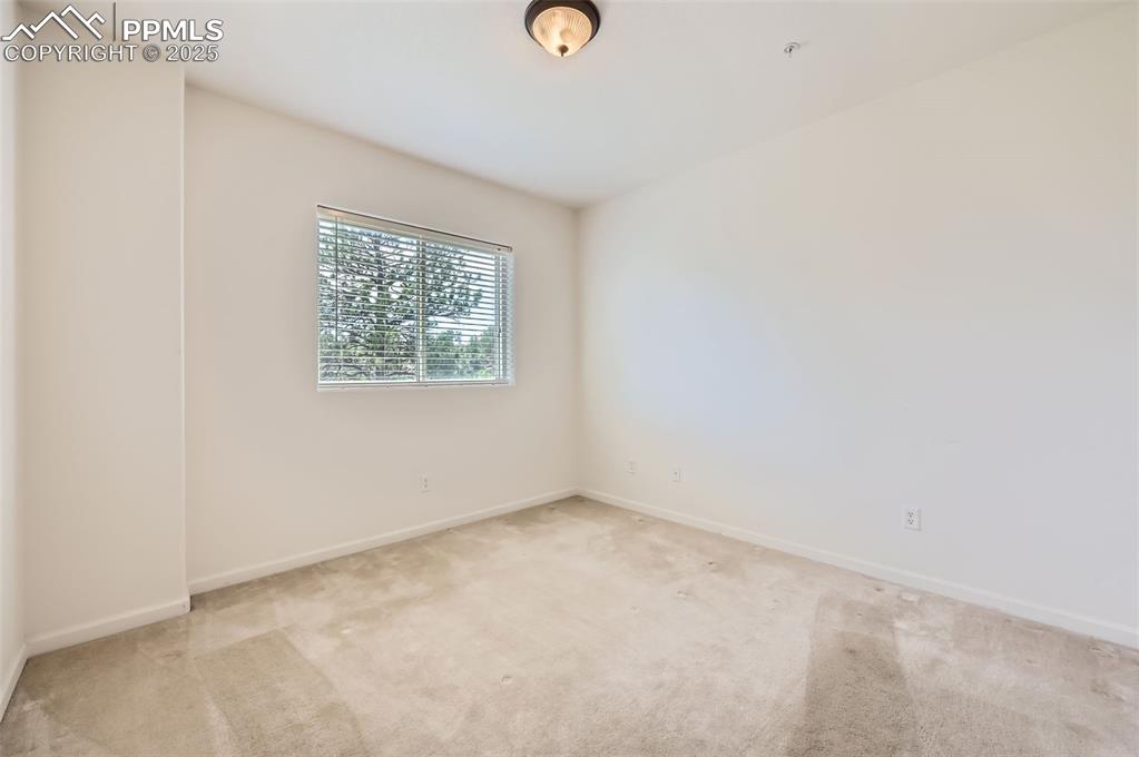 3755 Hartsock Lane, Unit 203 Colorado Springs, CO 80917 - Photo 24 of 43 an empty room with a window