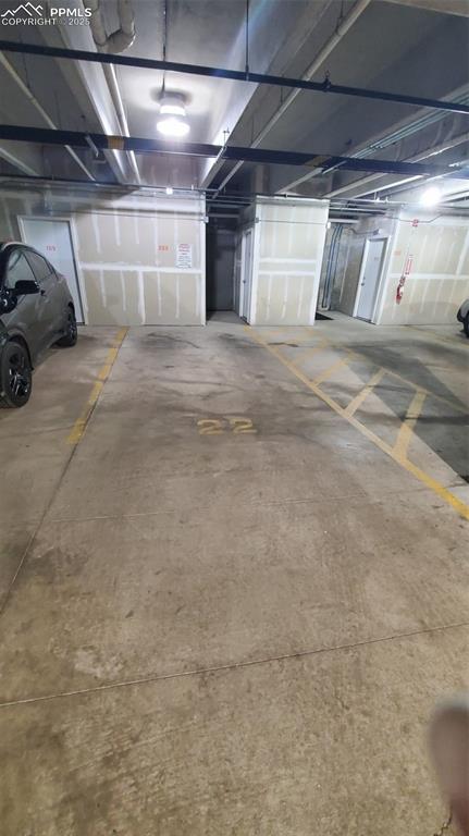 3755 Hartsock Lane, Unit 203 Colorado Springs, CO 80917 - Photo 40 of 43 a view of parking garage with cars