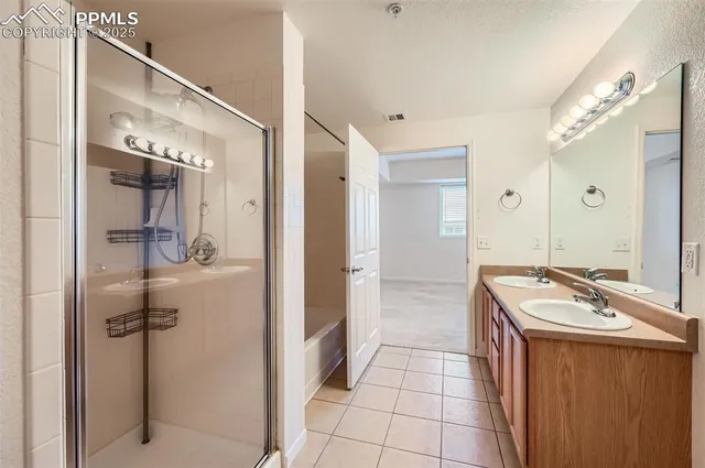 a room with a mirror and a sink