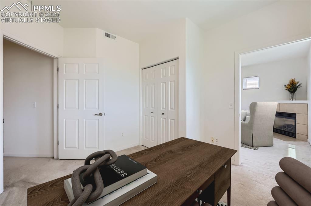 3755 Hartsock Lane, Unit 203 Colorado Springs, CO 80917 - Photo 10 of 43 a view of a workspace with furniture