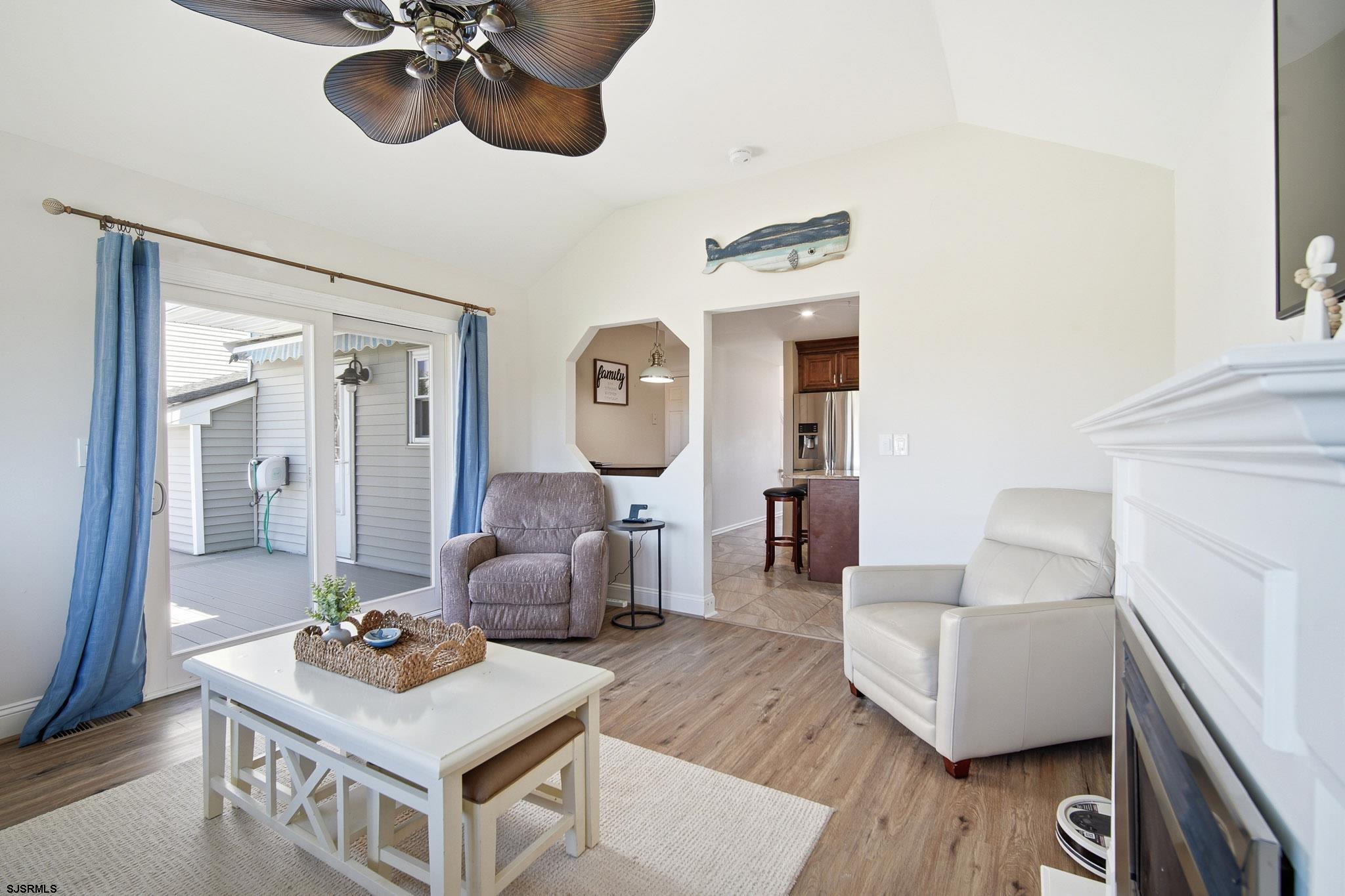 214 Hagen Road Brigantine, NJ 08203 - Photo 3 of 34 a living room with furniture and a wooden floor