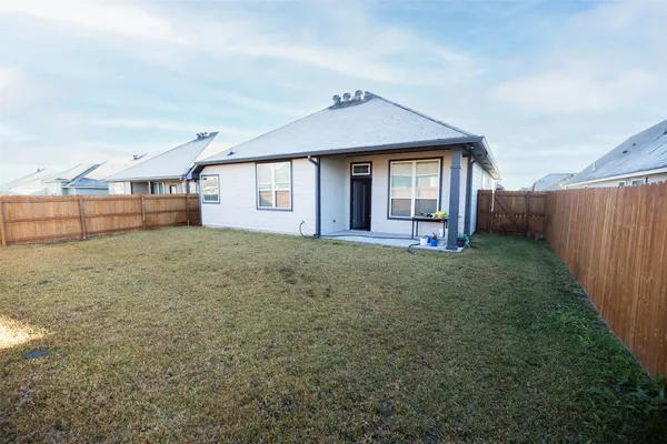 a view of backyard of house