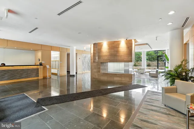 an open kitchen with a table and chairs in it