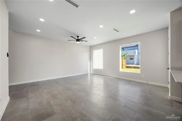 a kitchen with cabinets appliances and a sink