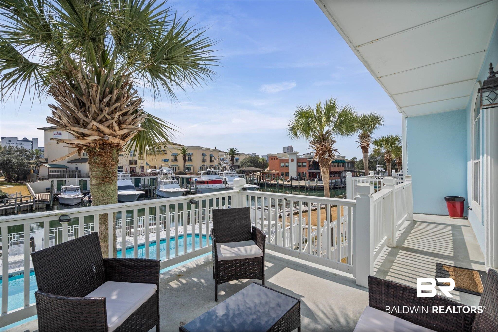 3575 Bayou Road, Unit B2 Orange Beach, AL 36561 - Photo 18 of 35 Balcony with view of pool and a water view