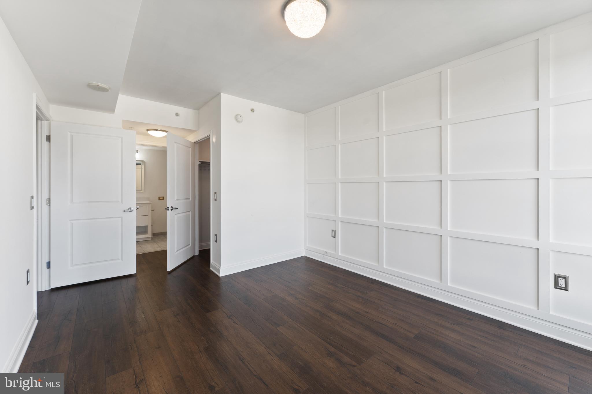 11760 Sunrise Valley Drive, Unit 809 Reston, VA 20191 - Photo 11 of 15 a view of a livingroom with wooden floor