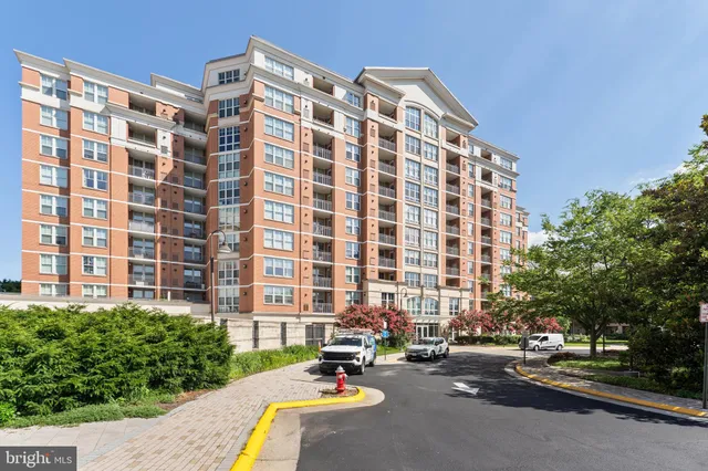 a front view of a building with street view