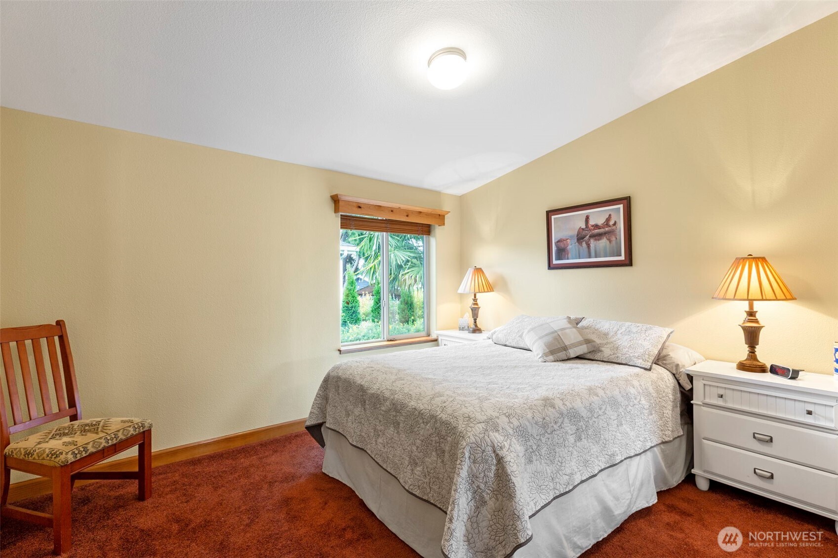 3611 I Street Northeast, Unit 424 Auburn, WA 98002 - Photo 19 of 34 a bedroom with a bed and a window