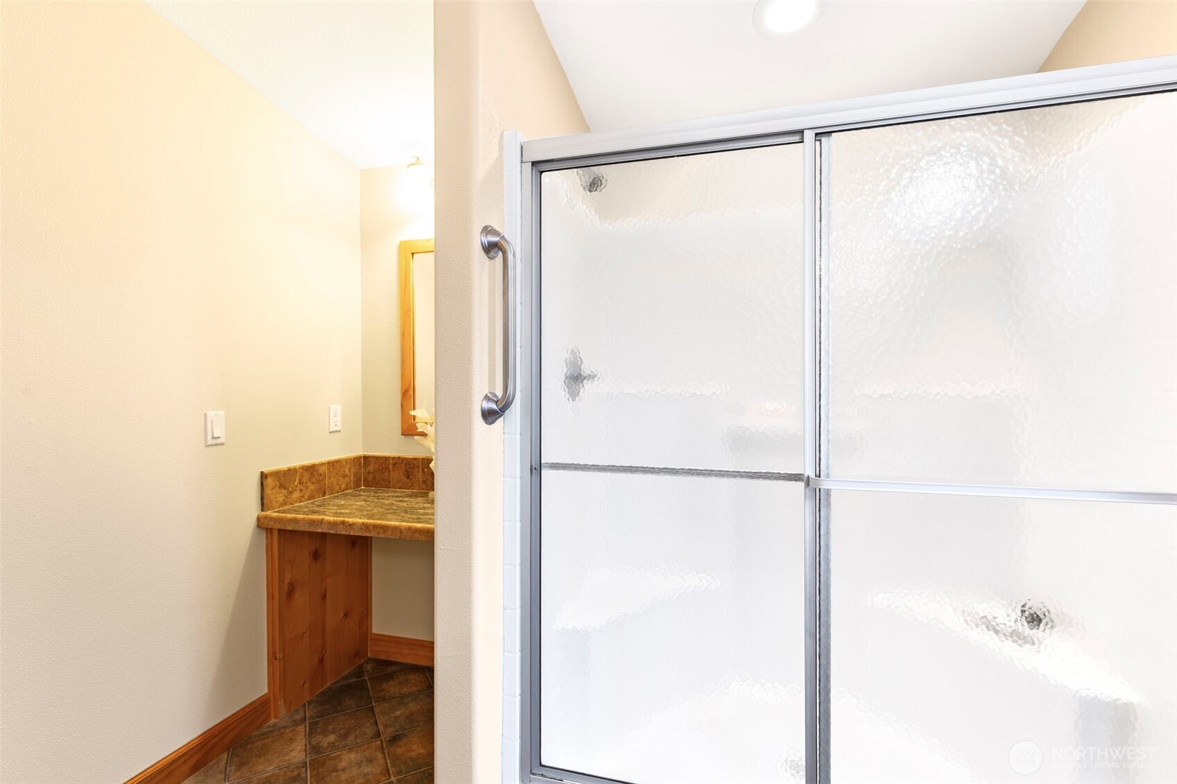 3611 I Street Northeast, Unit 424 Auburn, WA 98002 - Photo 24 of 34 a bathroom with a shower and a sink