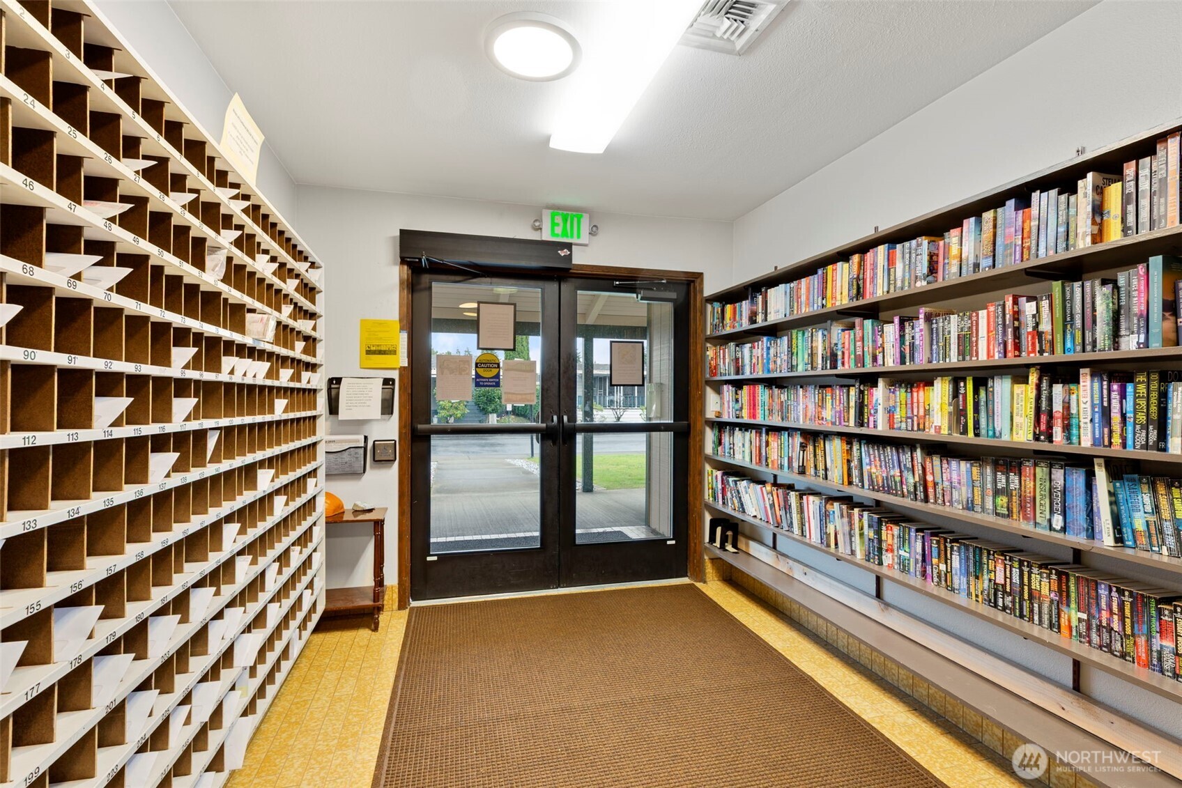 3611 I Street Northeast, Unit 424 Auburn, WA 98002 - Photo 25 of 34 a view of room with furniture book shelf