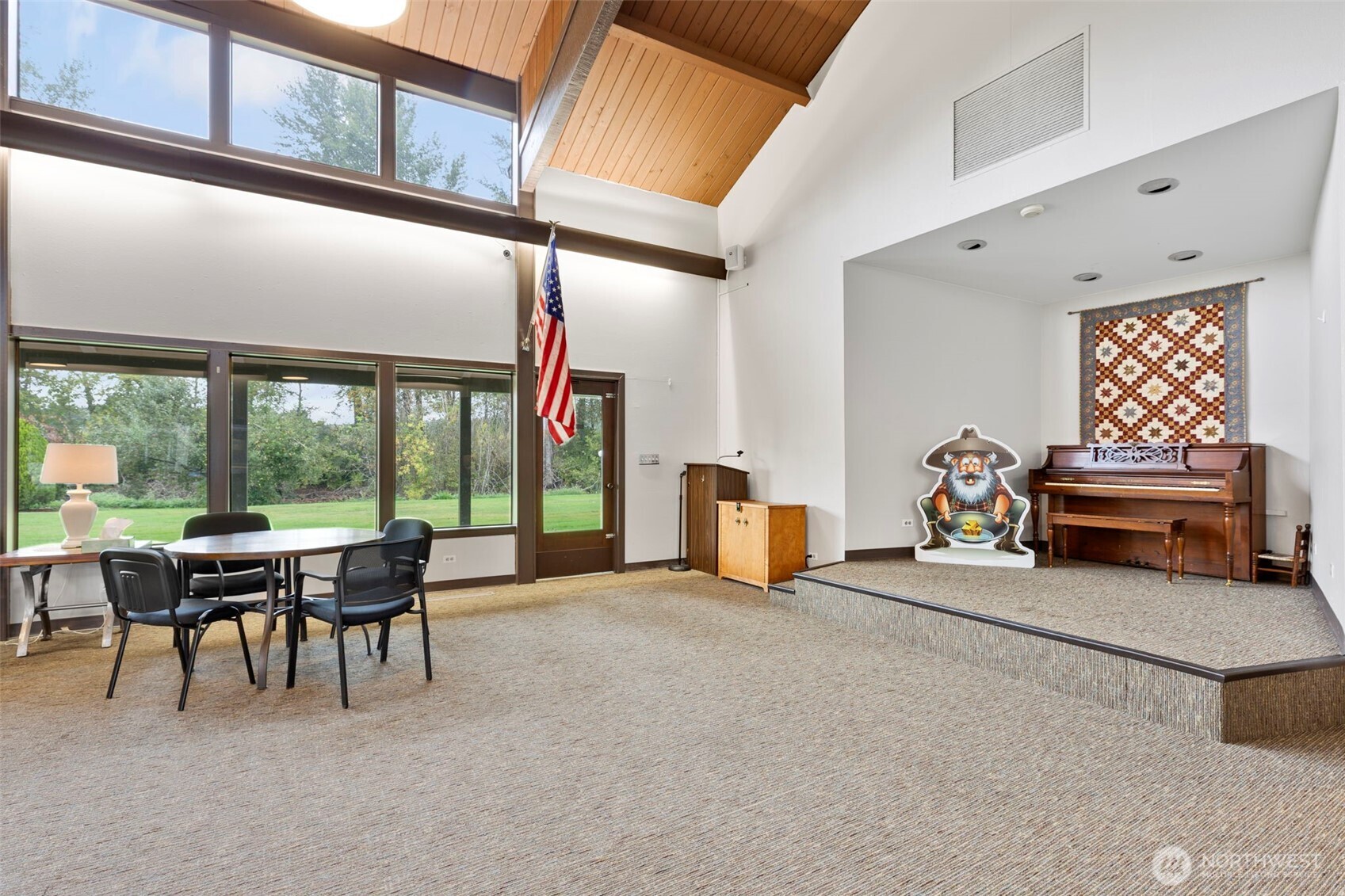 3611 I Street Northeast, Unit 424 Auburn, WA 98002 - Photo 27 of 34 a view of a livingroom with furniture and floor to ceiling window