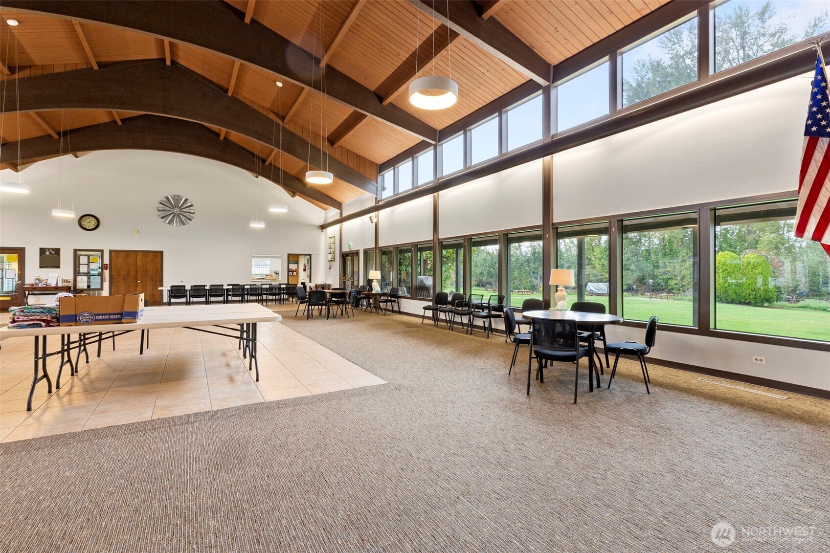 3611 I Street Northeast, Unit 424 Auburn, WA 98002 - Photo 28 of 34 a view of a swimming pool with a table and chairs