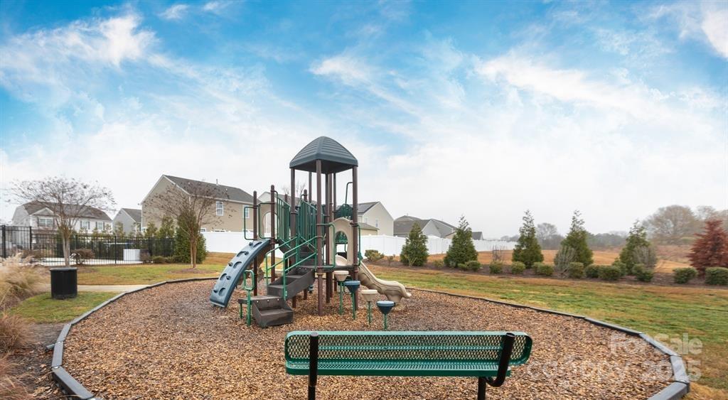 3224 Hawksbill Street Southwest Concord, NC 28027 - Photo 32 of 35 a park view with a sitting space