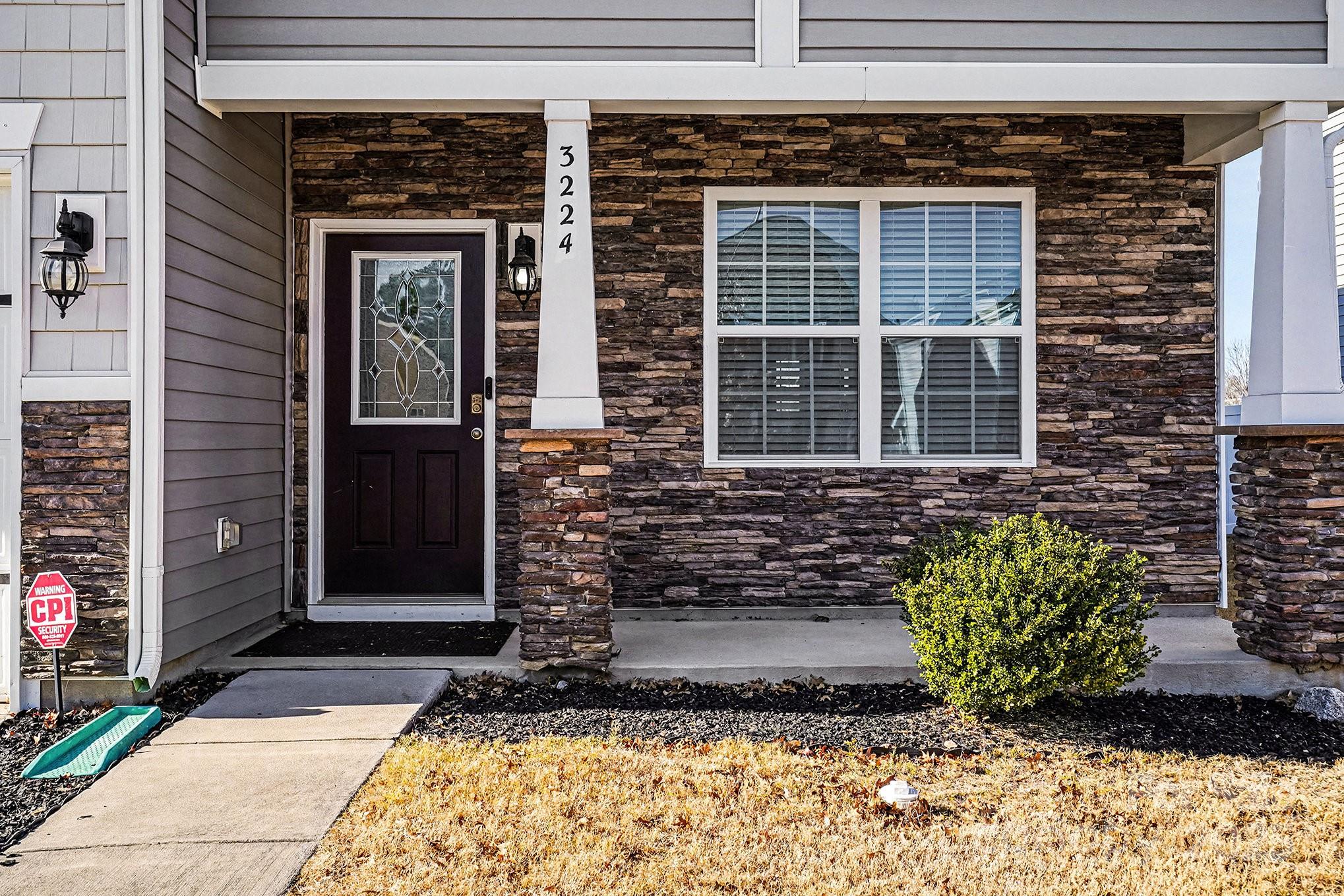 3224 Hawksbill Street Southwest Concord, NC 28027 - Photo 4 of 35 a front view of a house with a yard